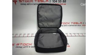 The original TESLA charger bag has the article 1126118-00-B 